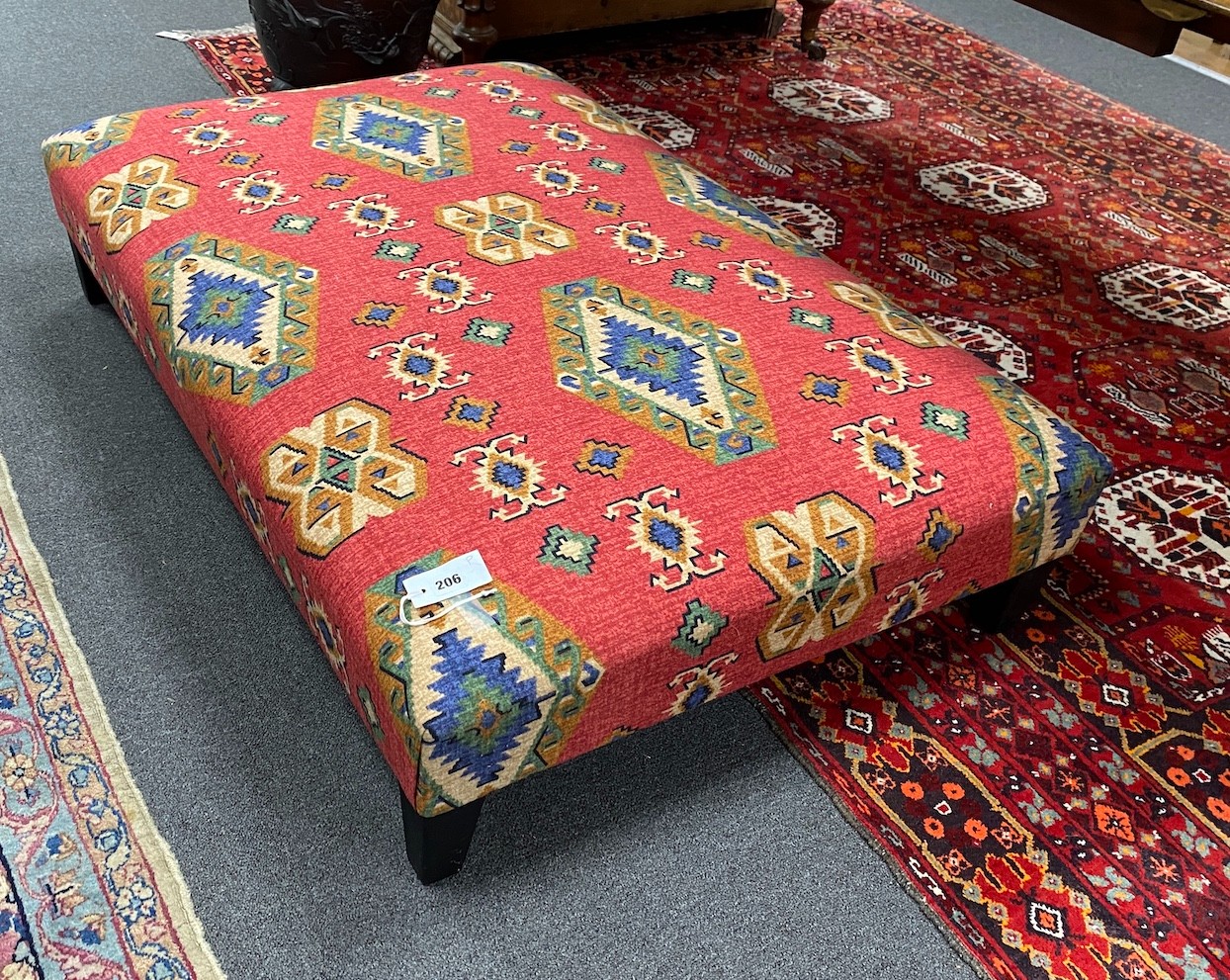 A large rectangular Kilim fabric footstool, length 123cm, depth 82cm, height 26cm